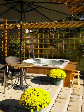 A hot tub with a bar surround.