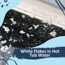 A hot tub with countless white flakes in the filter housing.