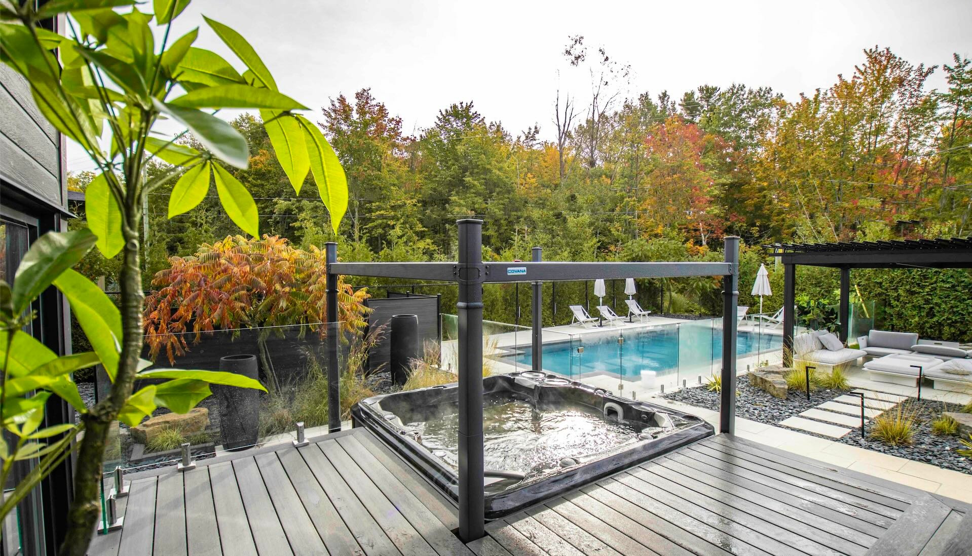 A Hydropool Hot Tub built into decking with an automated Covana cover.