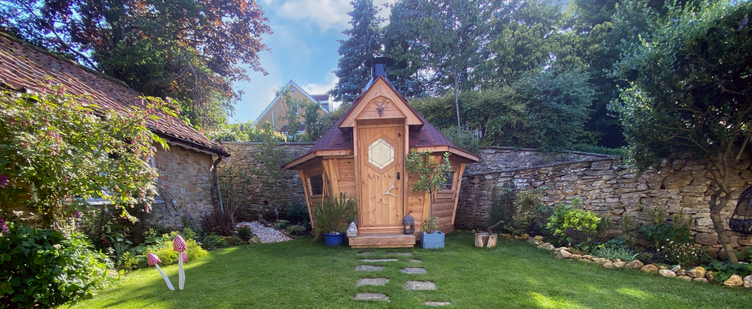 A grilling cabin in an English garden.