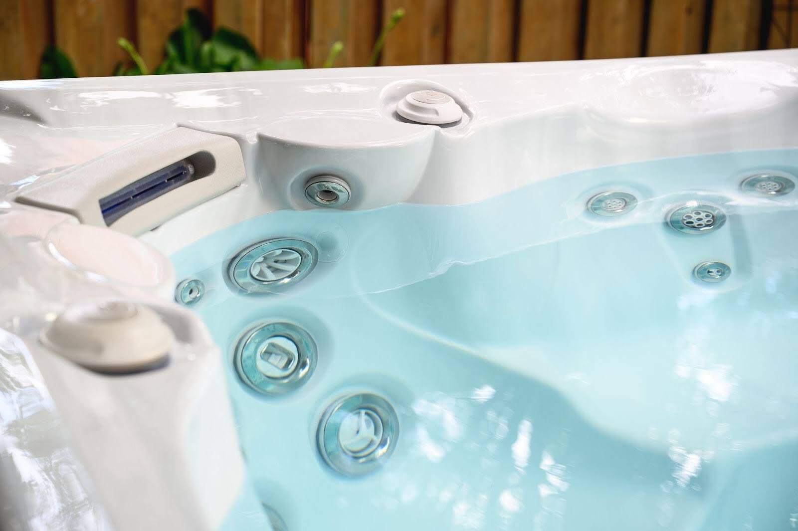  A close-up photo of a hot tub jet that can help keep hot tubs clean, minimising maintenance. 