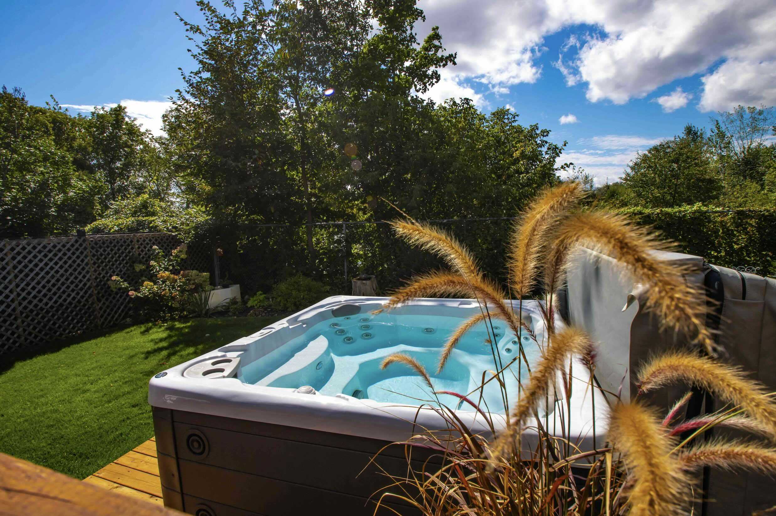 Crystal clear hot tub water on a sunny day.  